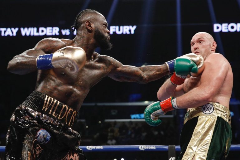 Deontay Wilder Won't Fight Anthony Joshua Unless He Gets Paid 50% of the  Purse